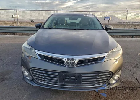 2014 Toyota Avalon Base z USA, uszkodzony, nr VIN 4T1BK1EB8EU093347